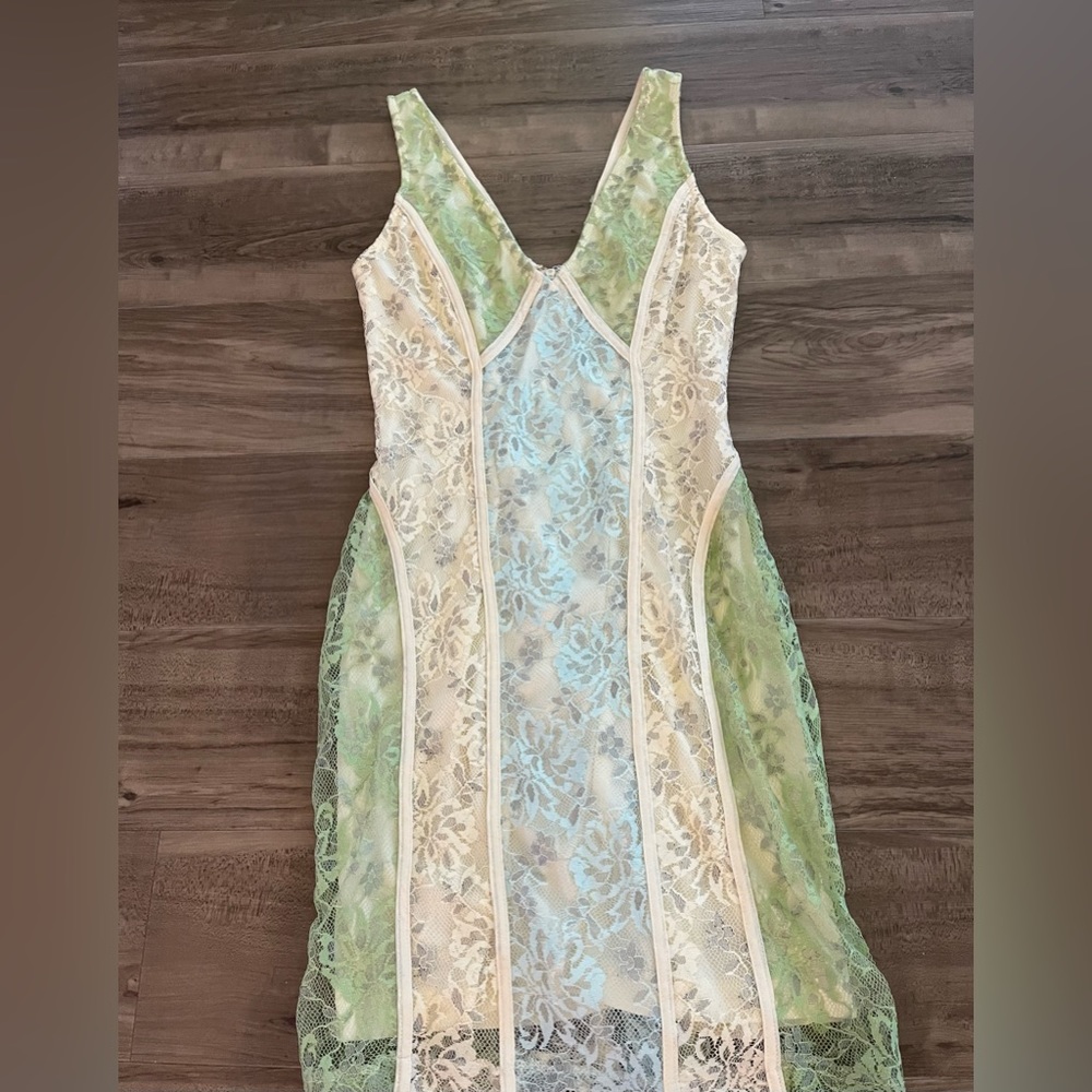 This gorgeous lace dress creates an ultra-romantic look for Spring or Summer!